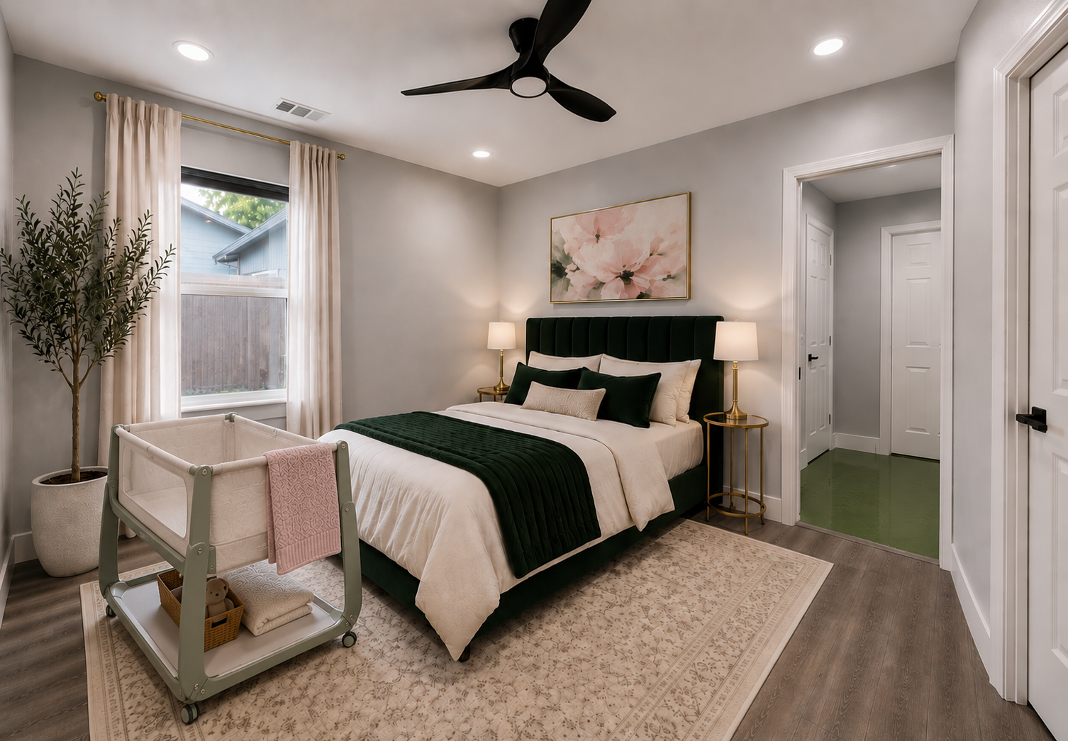 One of our suites, warm whites, deep greens, room for baby's bassinet